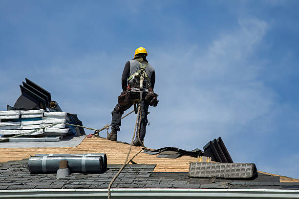 Professional Roofing technician working in South Lancaster, MA